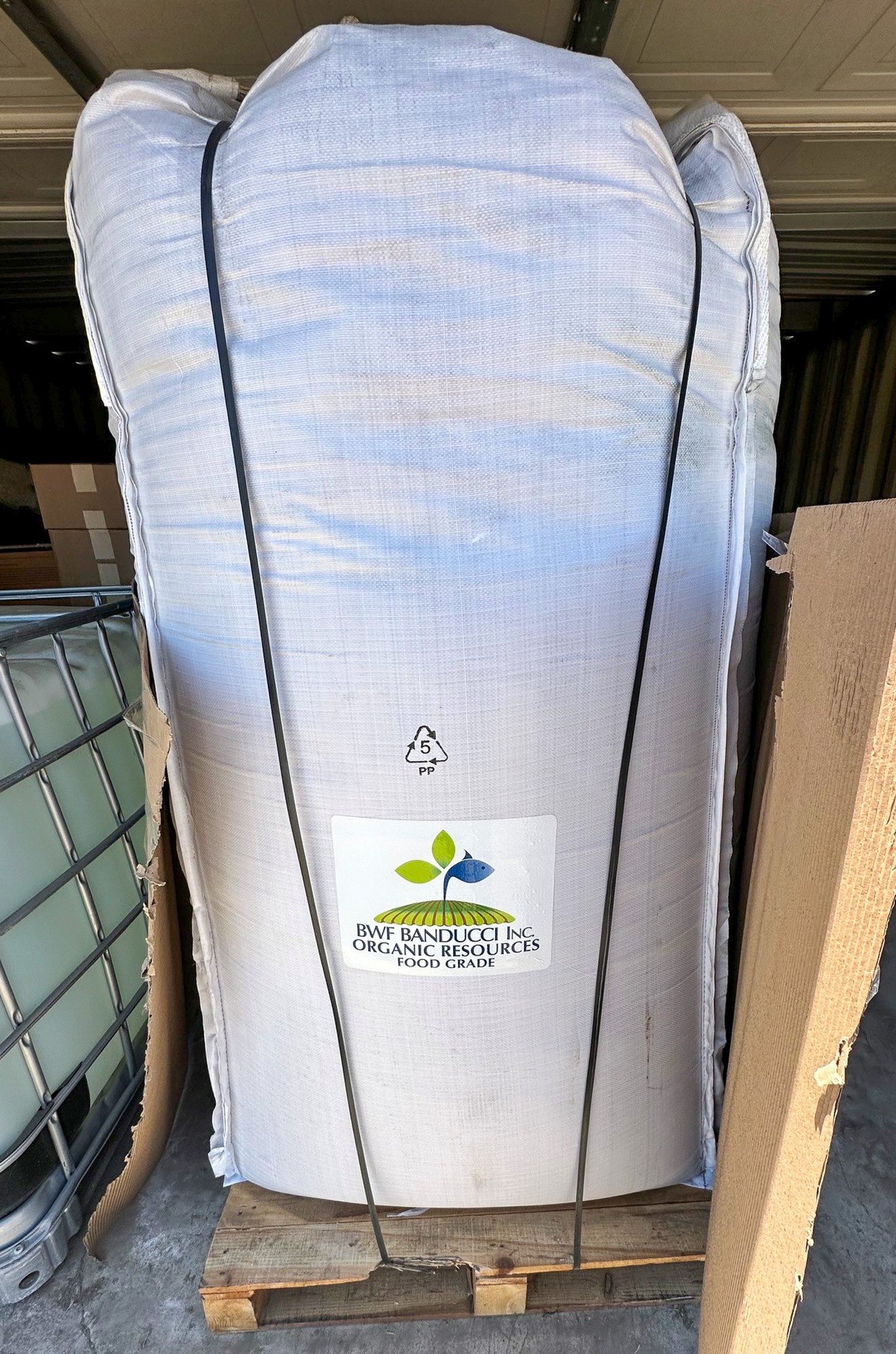 A BWF Banducci branded bulk sack of dry organic fertilizer